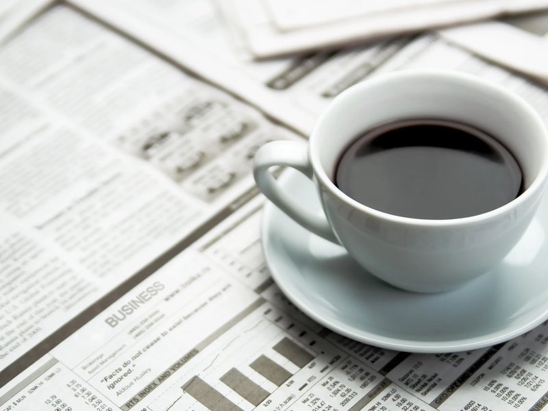 A cup of coffee on a table from The Carpet Yard in McLean, VA